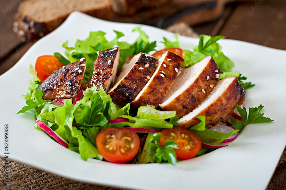 Fresh vegetable salad with grilled chicken breast