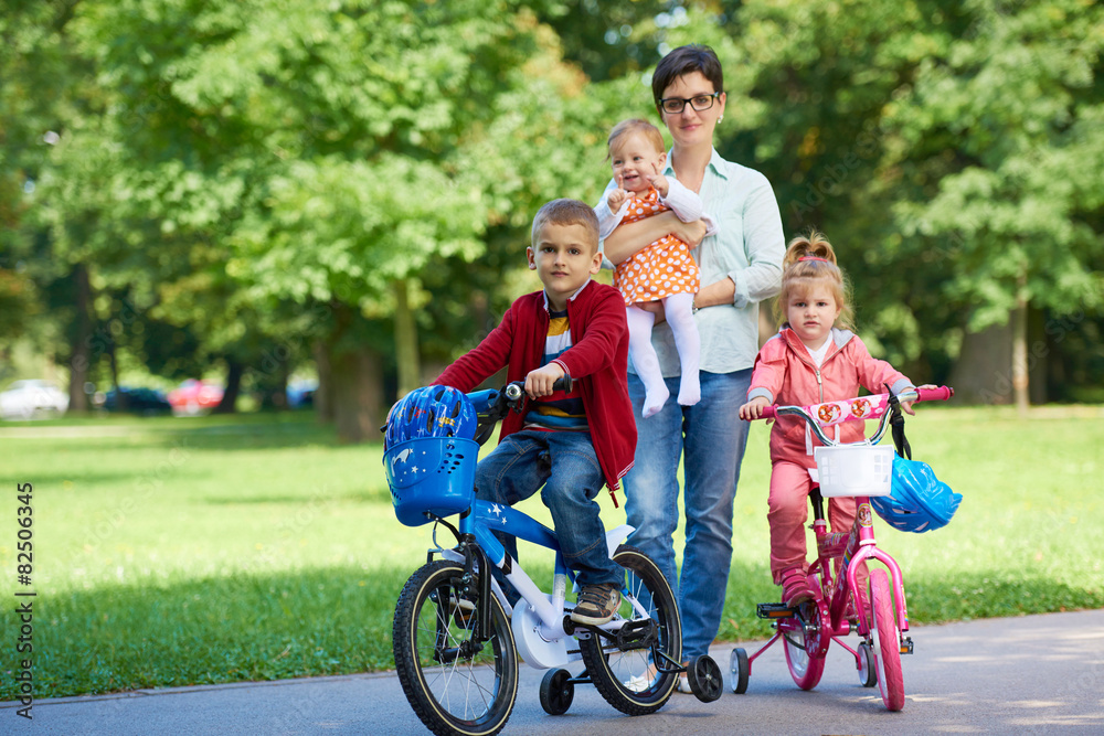 happy young family in park happy young family in park