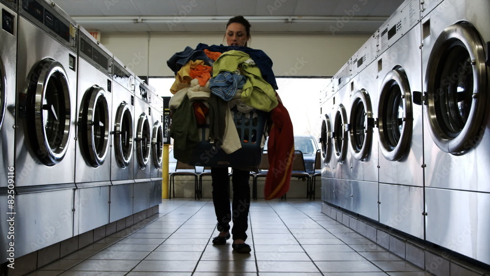young woman at laundromat