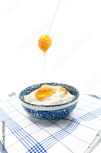Greek yogurt with honey in a pot