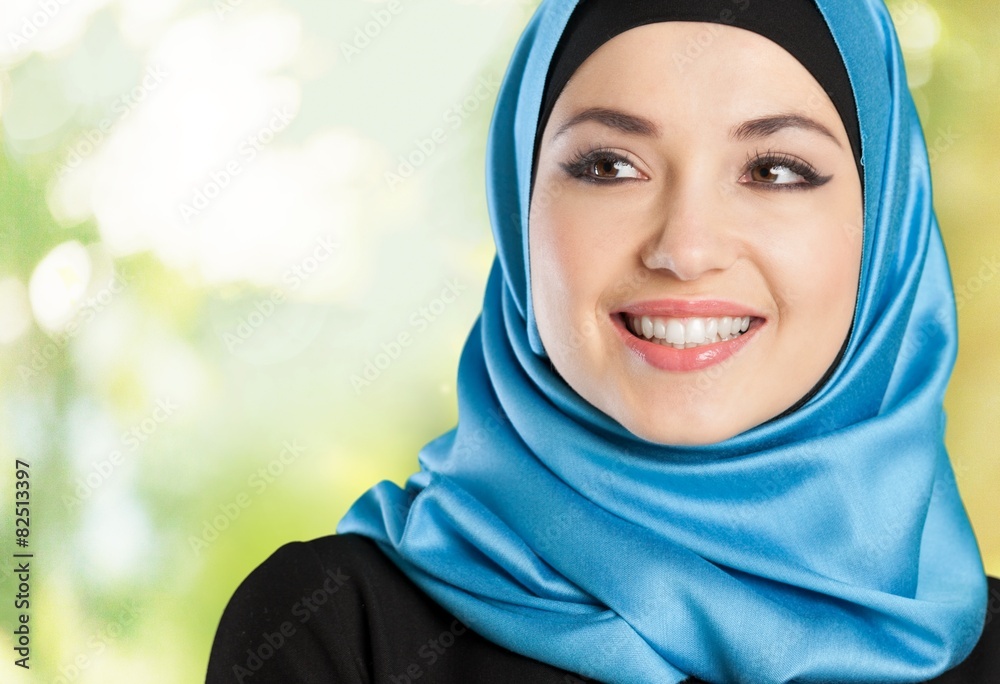 Above. Beautiful arab woman face looking an advertising above Above. Beautiful arab woman face looking an advertising above