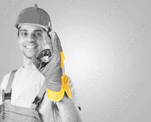 Repairman. Workman making a perfect gesture with his gloved hand