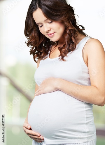 Free Download Adorable. Portrait of adorable pregnant woman in white - GFXLoad