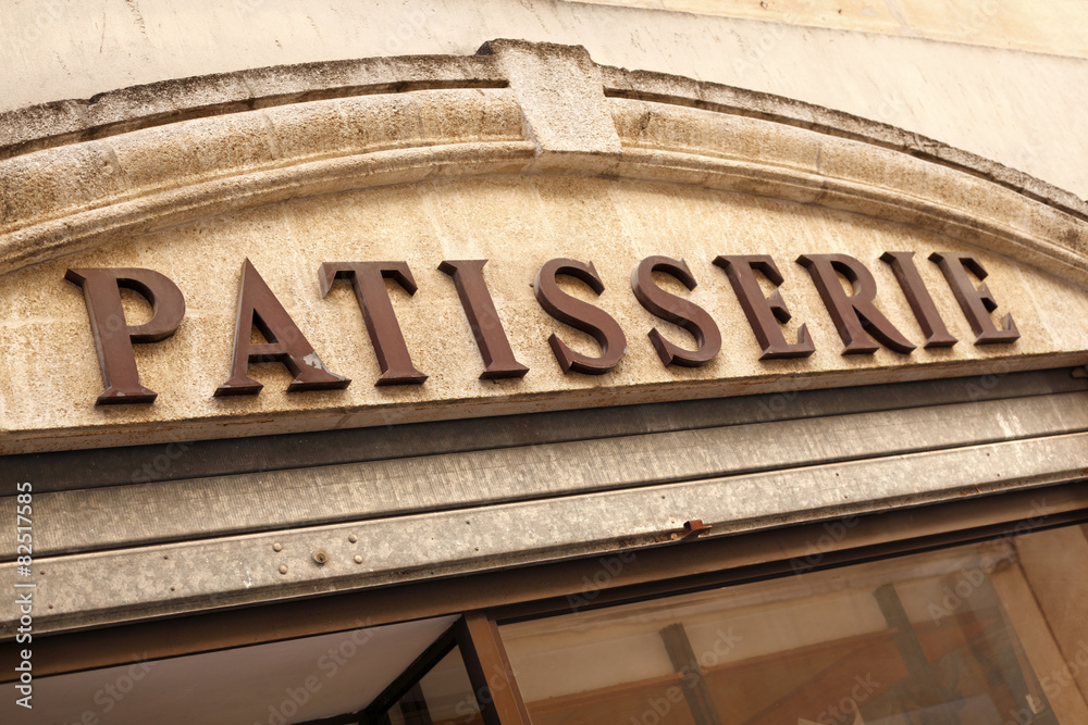 Obraz premium Patisserie sign over a bakery shop Paris France photo