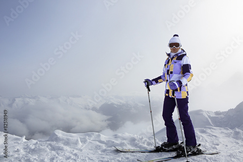 Skier on top of the Aibga Ridge.