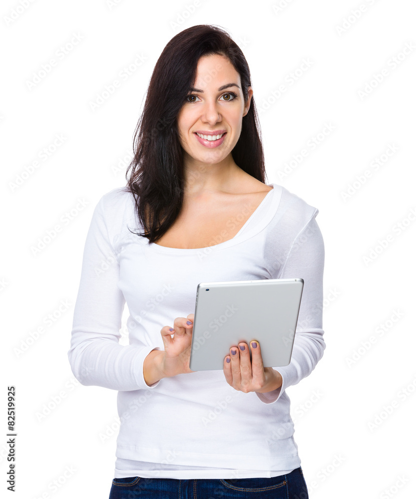 Brunette woman use of digital tablet Brunette woman use of digital tablet
