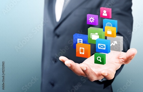 Market. Cloud of colorful application icons in the hands of