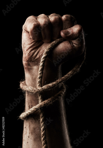 Male hand with rope. Conception aggression © Nik_Merkulov