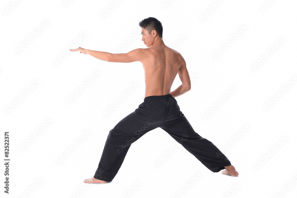 Young sportsman, fitness muscle model guy making bodybuilding exercise isolated on white. Concept of sport, health Young sportsman, fitness muscle model guy making bodybuilding exercise isolated on white. Concept of sport, health