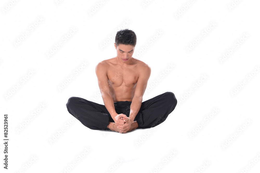 Muscular male model in sportwear sitting on the floor, Muscular male model in sportwear sitting on the floor,