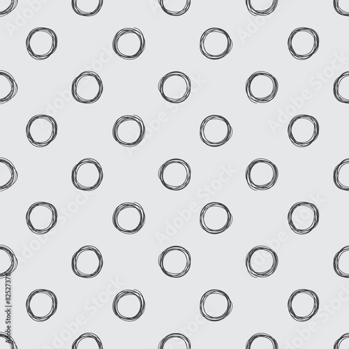 Seamless hand-drawn polka dot pattern.