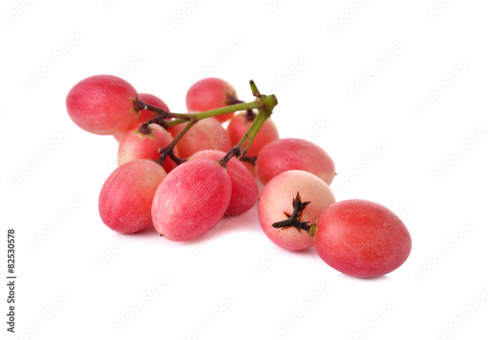Red karonda fruit isolated on white background. Red karonda fruit isolated on white background.