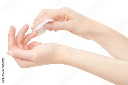 Woman hand and nail varnish remover, acetone, clipping path