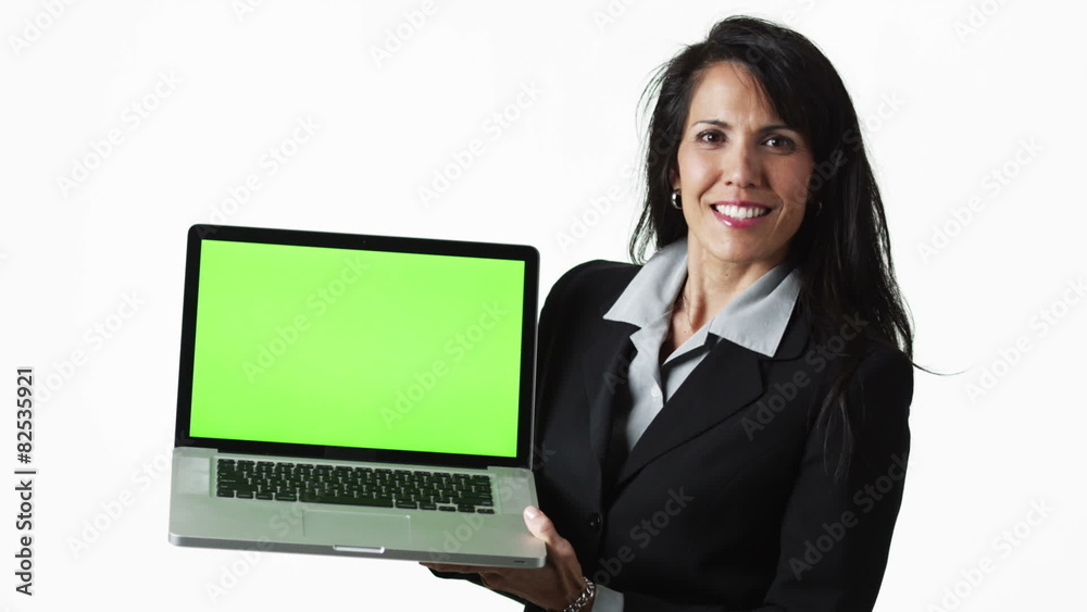MS Businesswoman holding laptop, against white background / Orem, Utah, USA MS Businesswoman holding laptop, against white background / Orem, Utah, USA