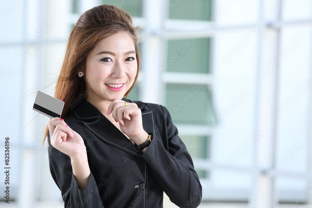 Portrait lovely girl hold her Credit card