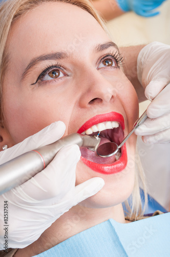 Beautiful woman having dental exam