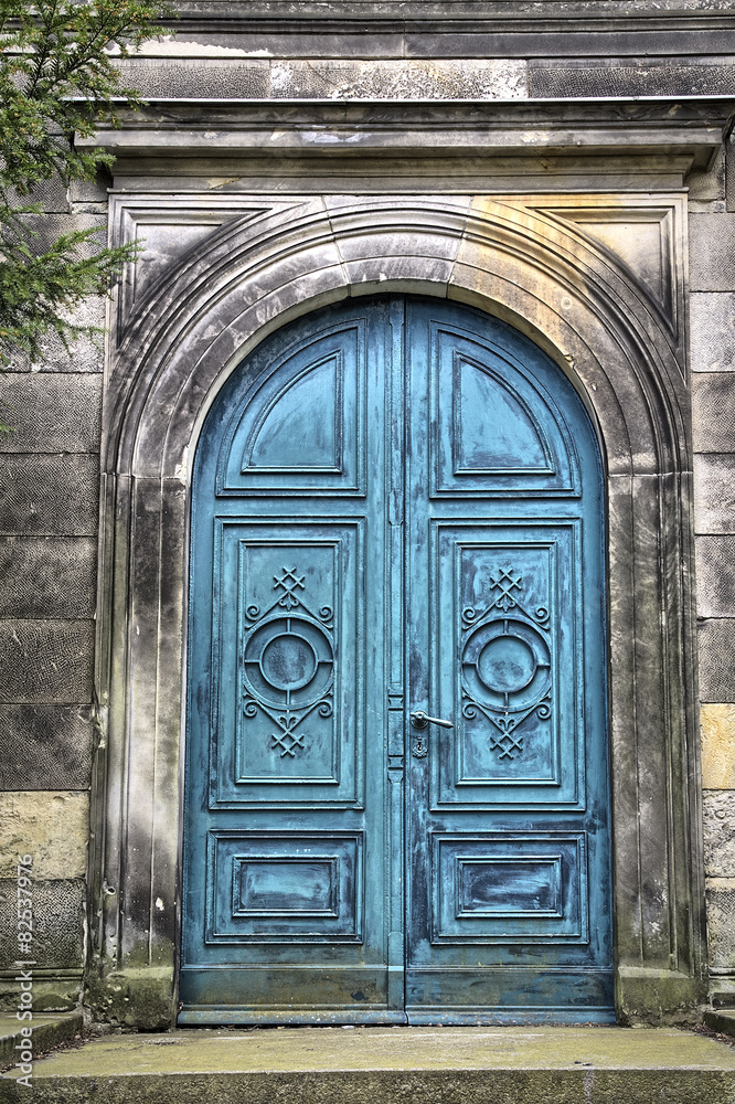 ancient blue gate to a tomb