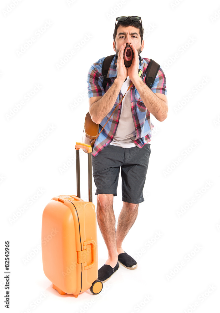 Tourist shouting over white background Tourist shouting over white background