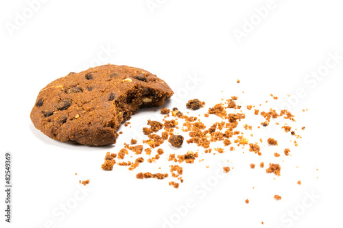 Α bitten cookie with crumbs, isolated on white photo