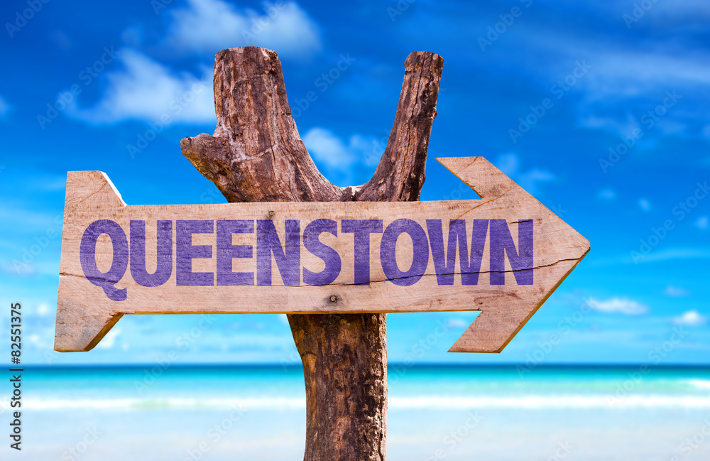 Queenstown wooden sign with lake background