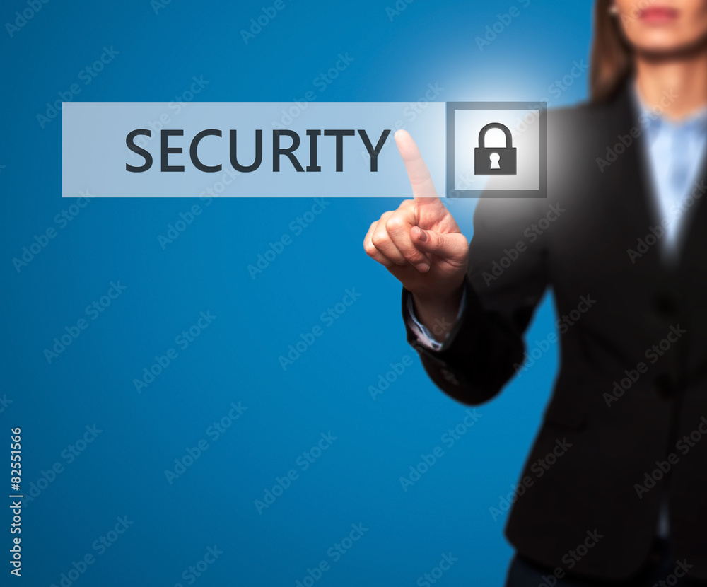 Businesswomen pressing security button on virtual screen. Businesswomen pressing security button on virtual screen.