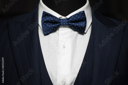 Tuxedo and bow tie on the unrecognizable person