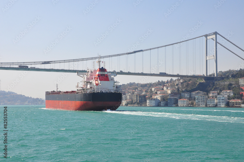 Large Cargo Tank passing the bosphorus bridge, Istanbul, Turkey