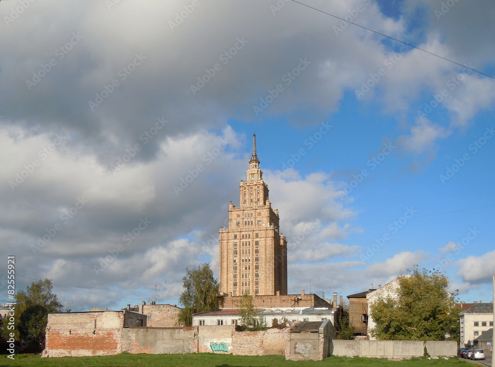Fototapeta premium Cityscape with scyscraper and clouds