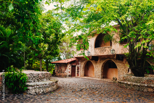 Road in park. Ancient village Altos de Chavon - Colonial town photo