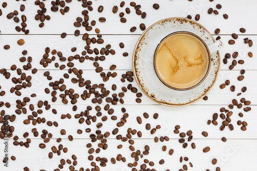 Cup of coffee, coffee background. Top view