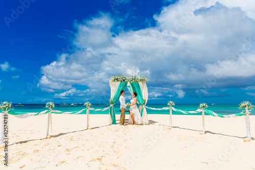 Wedding ceremony on a tropical beach in blue. 