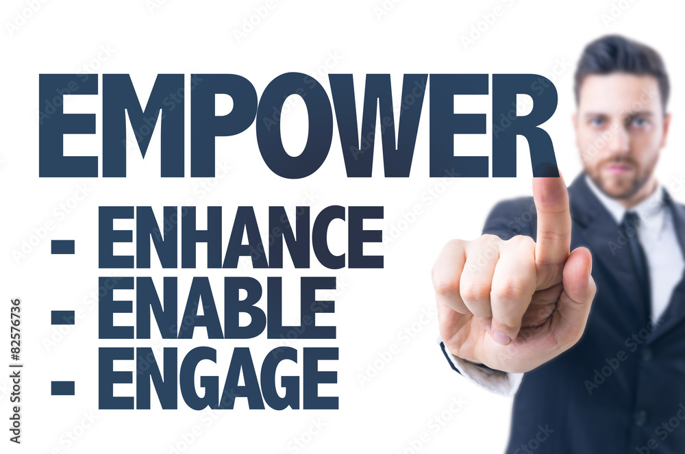 Business man pointing the text: Empower Business man pointing the text: Empower