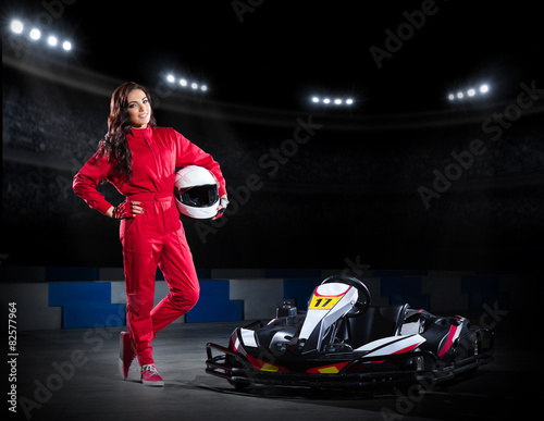 Girl karting racer at stadium