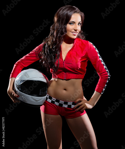 Young girl in red racing costume