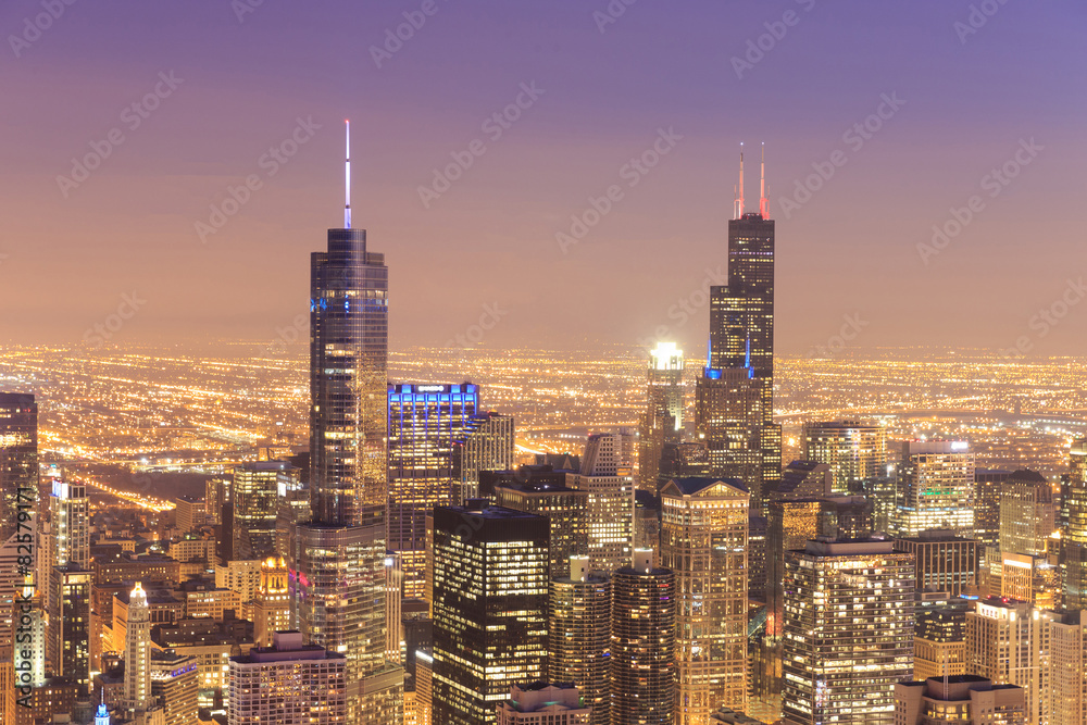 Aerial view of Chicago downtown at nigh from high above.