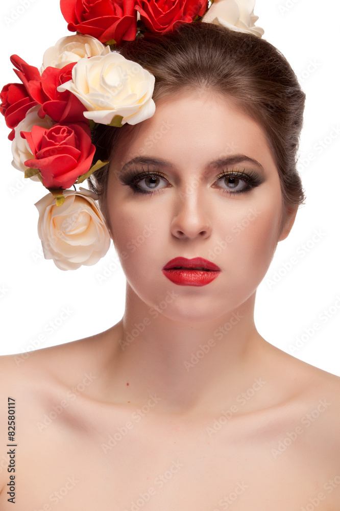Girl with flowers in head isolated over white background