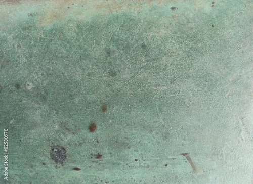 grunge bronze surface in black blue green