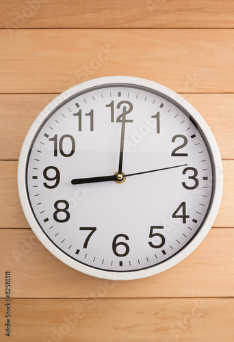 wall clock on wood