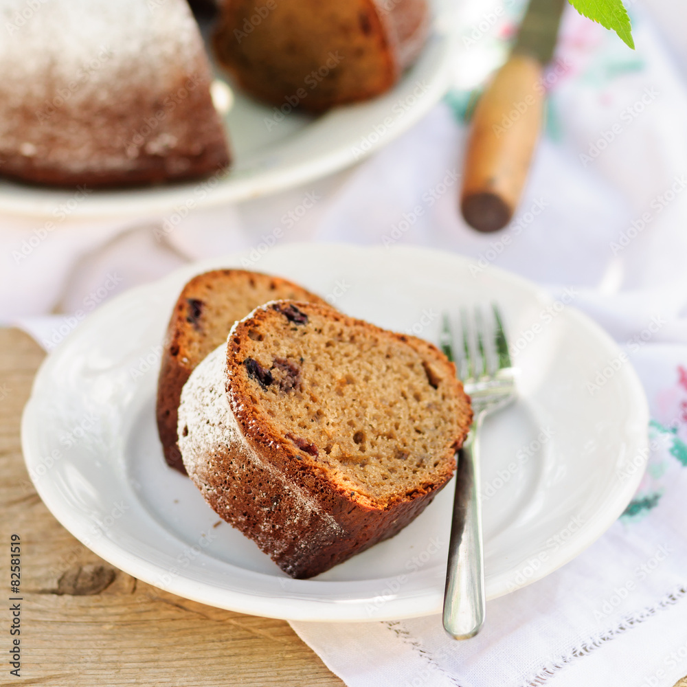 Slices of Rustic Style Bundt Cake Sprinkled with Icing Sugar