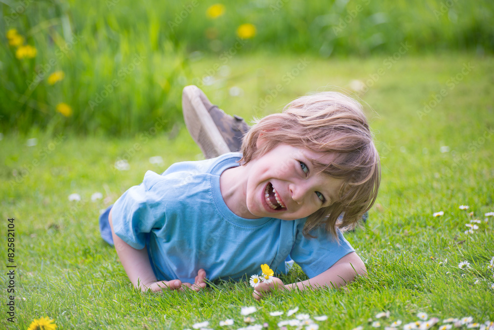 Fototapeta premium Cute little boy playing in the park 