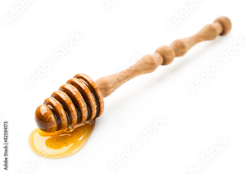 Wooden dipper with honey