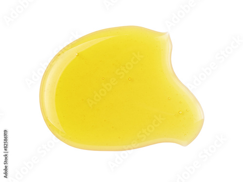 fresh natural honey drop isolated