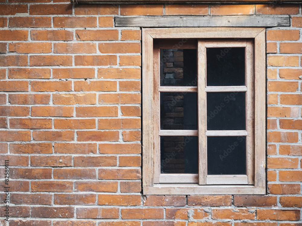 Brick wall with wooden window