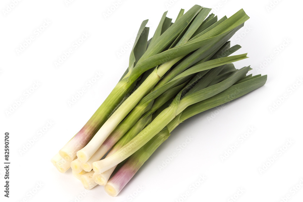 Young green garlic isolated on white background Young green garlic isolated on white background