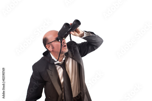Uomo d'affari con binocolo