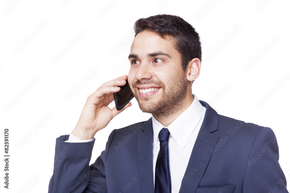 Happy smiling business man talking on the phone, isolated on whi Happy smiling business man talking on the phone, isolated on whi