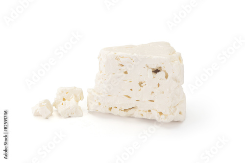 White cheese from sheep's milk on white background