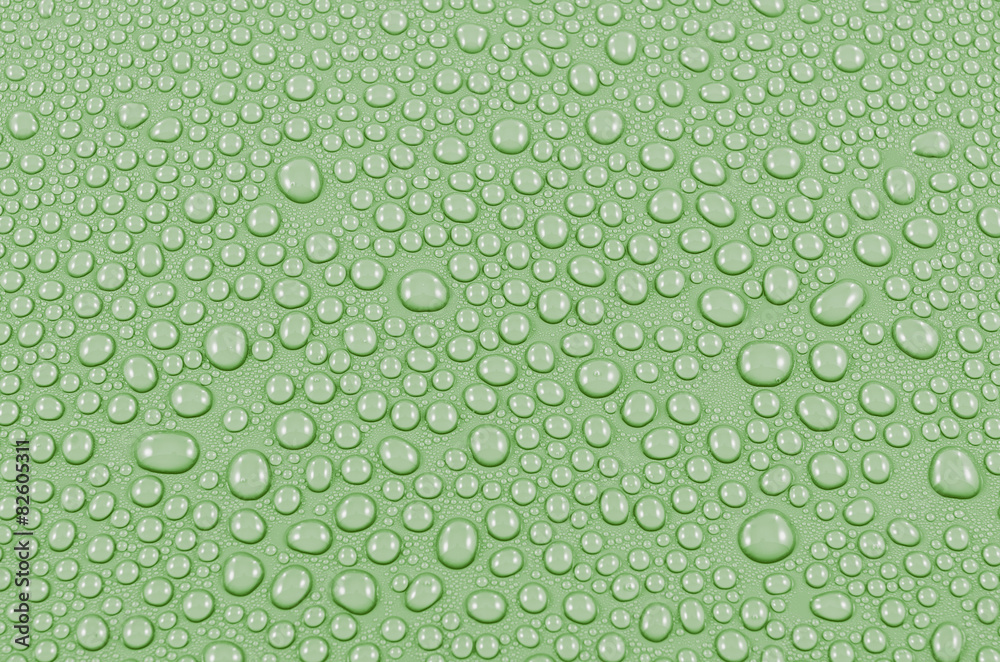 Green water drops background or texture. Close-up Green water drops background or texture. Close-up