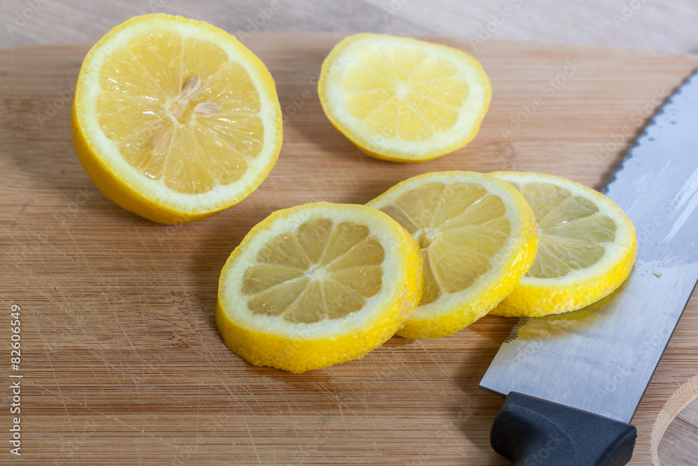 Sliced Lemons on a Cutting Board Sliced Lemons on a Cutting Board
