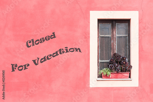 Closed window with planter - Closed for vacation